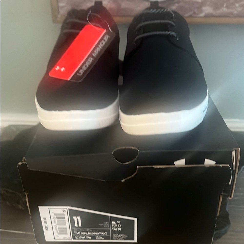 Under Armour Black and White Slip-On Sneakers